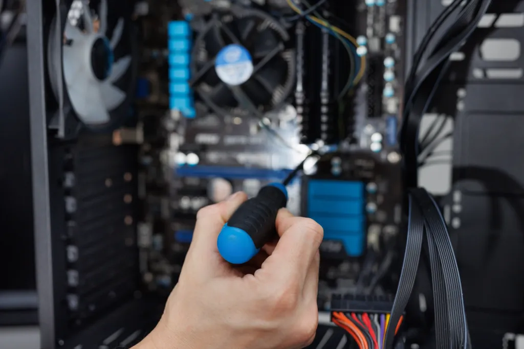 closeup-computer-technician-holding-a-screwdriver-2026-01-07-05-42-41-utc-6ad9c6fce937b
