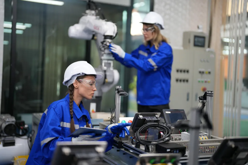 robotic-arm-engineer-check-on-equipment-in-its-wit-2026-01-07-06-59-07-utc-697cf95f35948